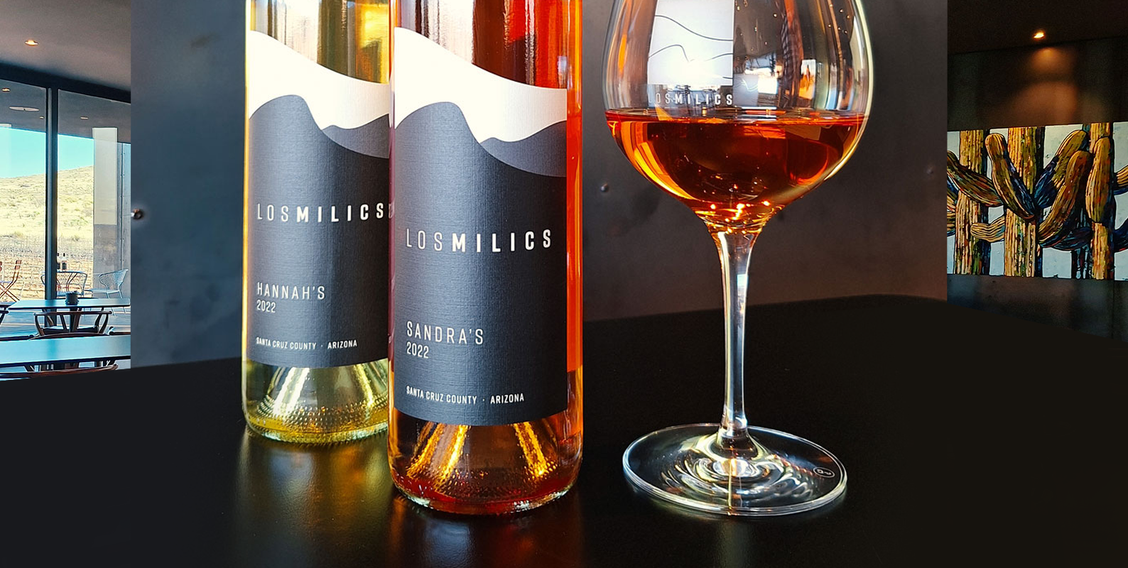 Interior of winery tasting room with tables and benches